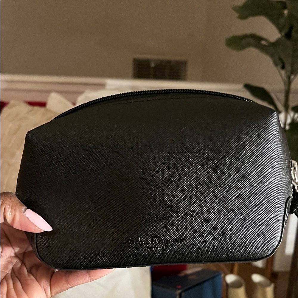 Salvatore Ferragamo makeup bag.